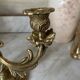 Pair of rocaille candlesticks in gilded bronze