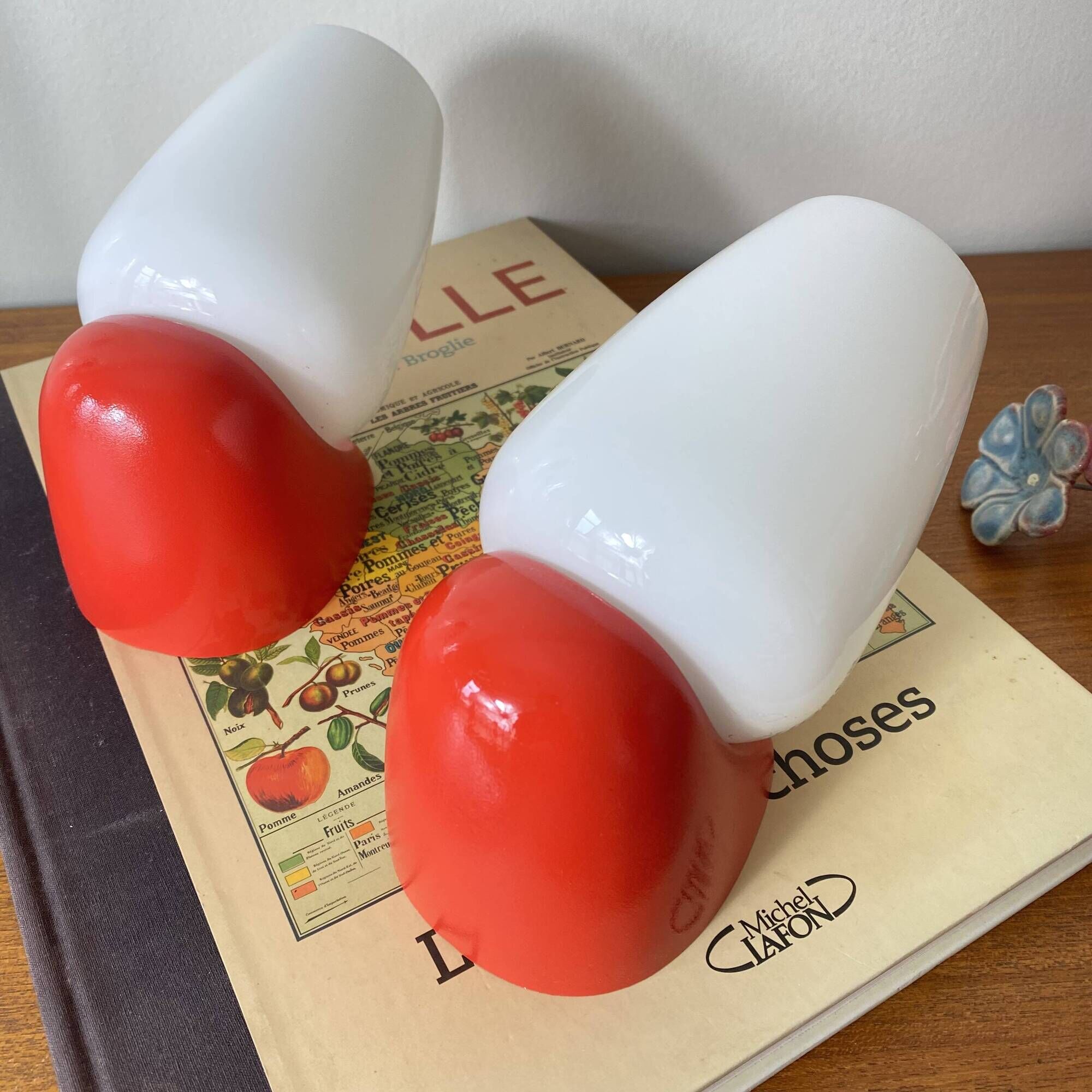 Pair of vintage wall lights in plastic and white opaline glass.