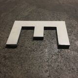 Letter e in old zinc