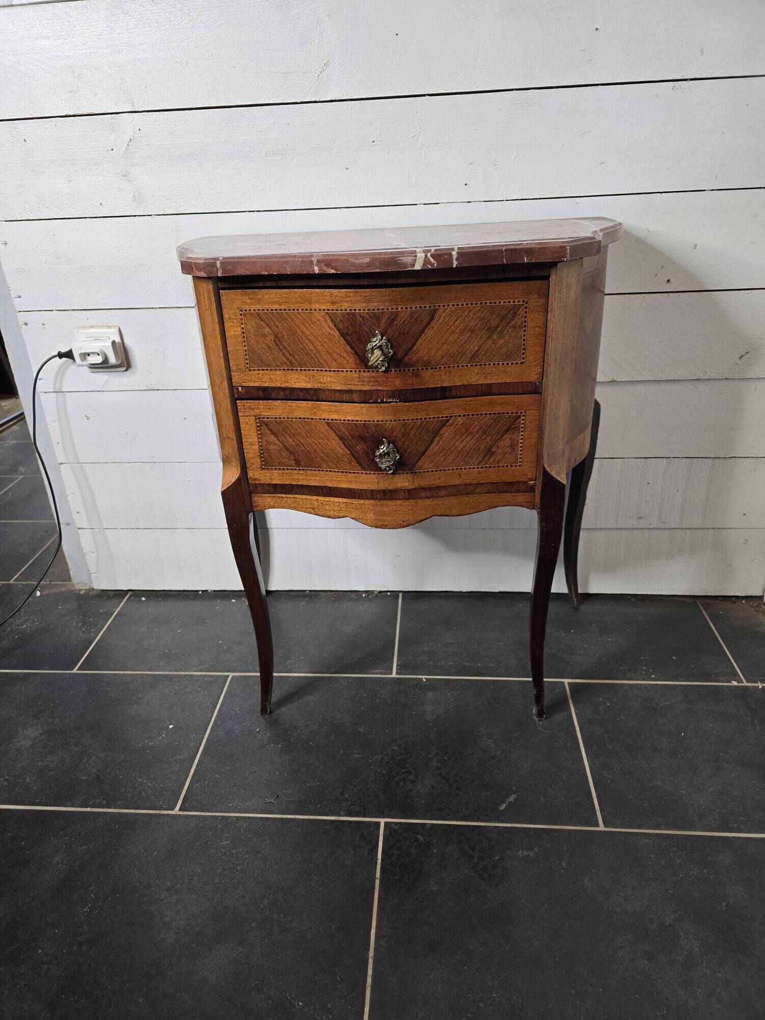 Curved chest of drawers in Louis XV style marquetry