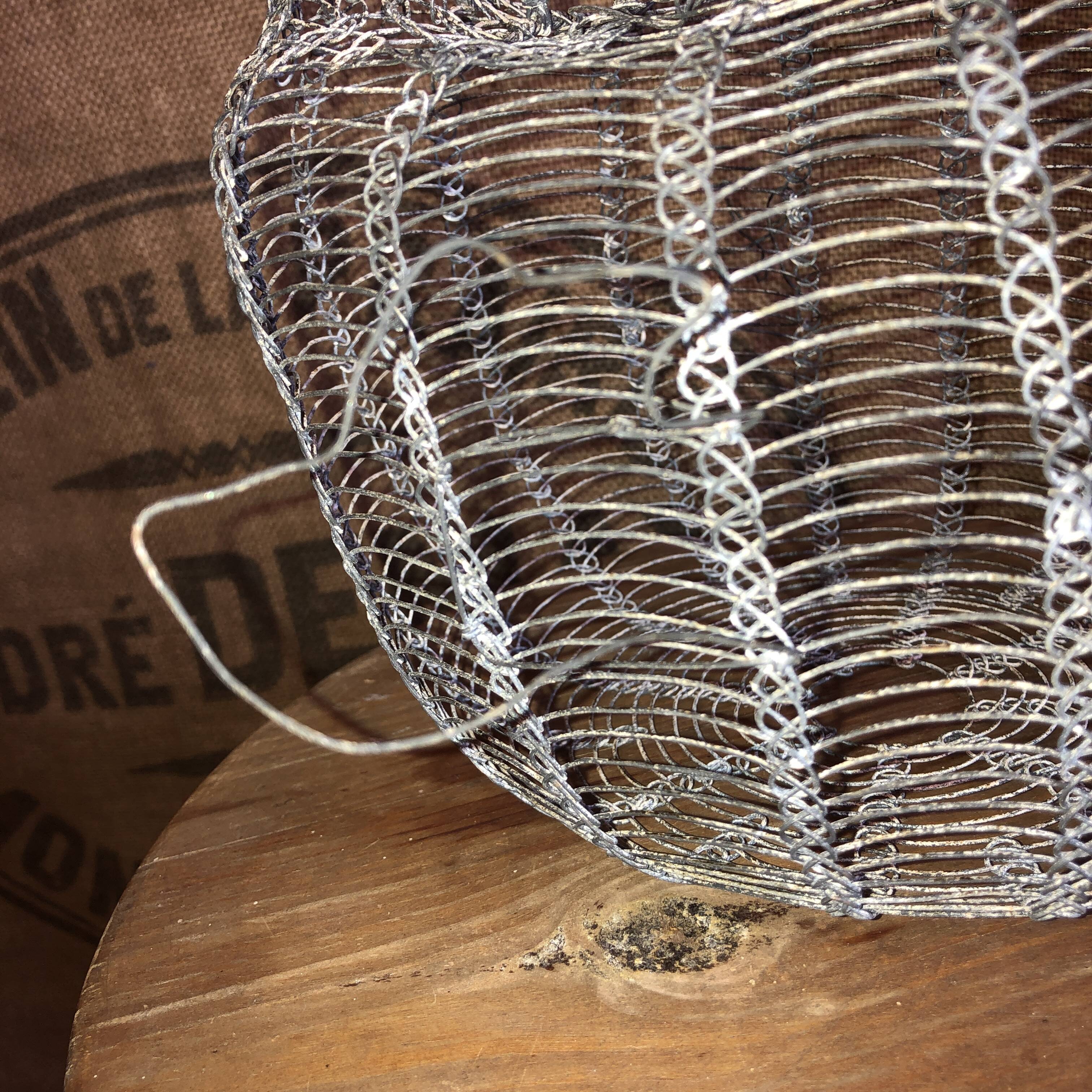 Old wire and mesh egg basket