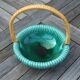 Empty basket vintage pocket in green ceramic and wicker