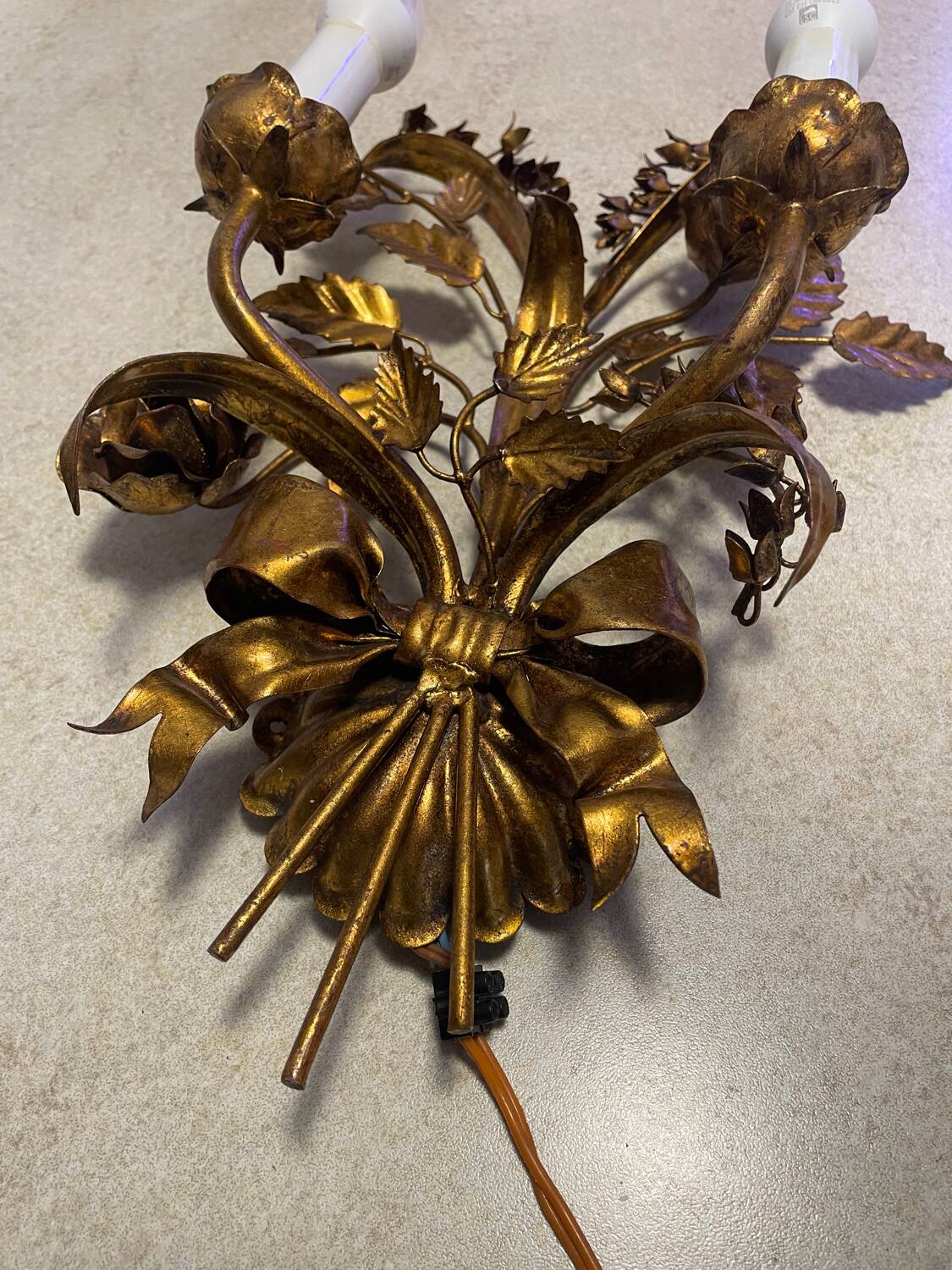 Wall light in the style of Hans Kögl, mid-20th century.