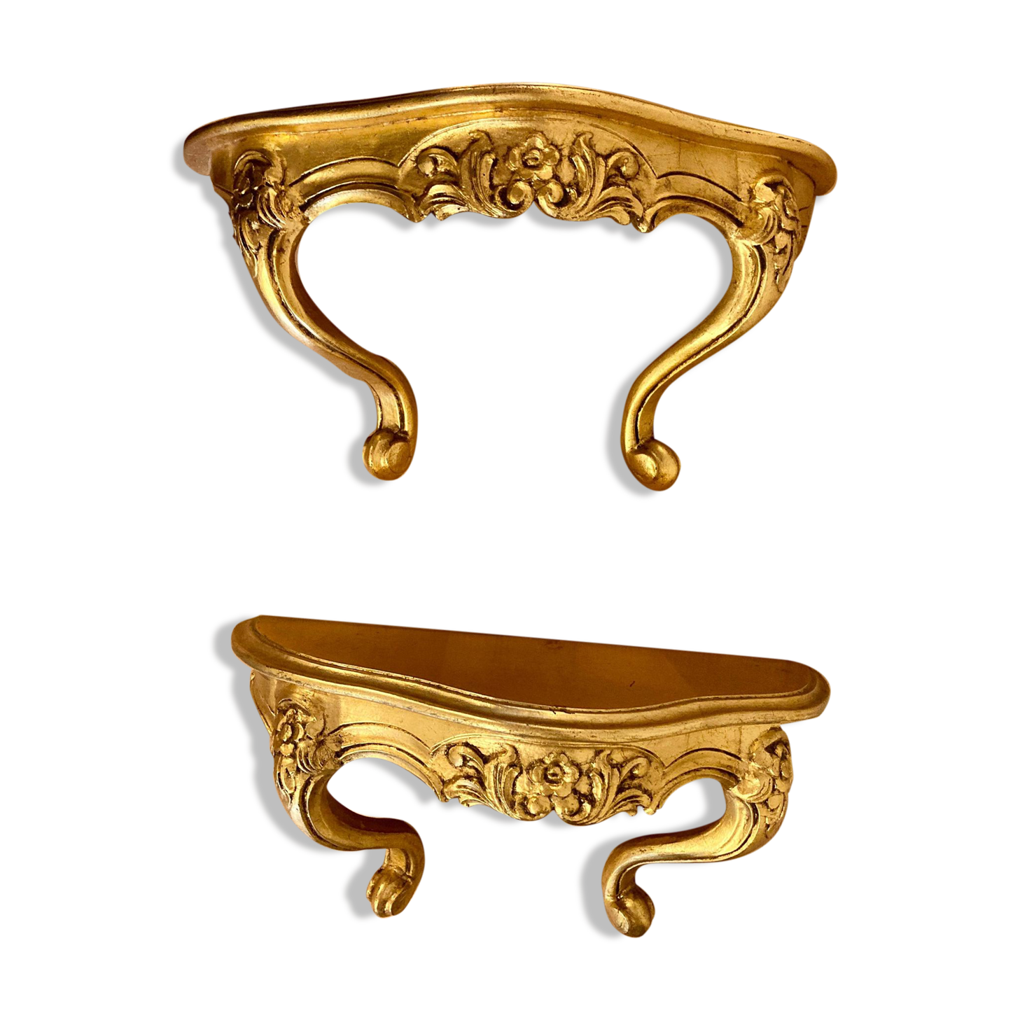 Pair of gilded wall shelves