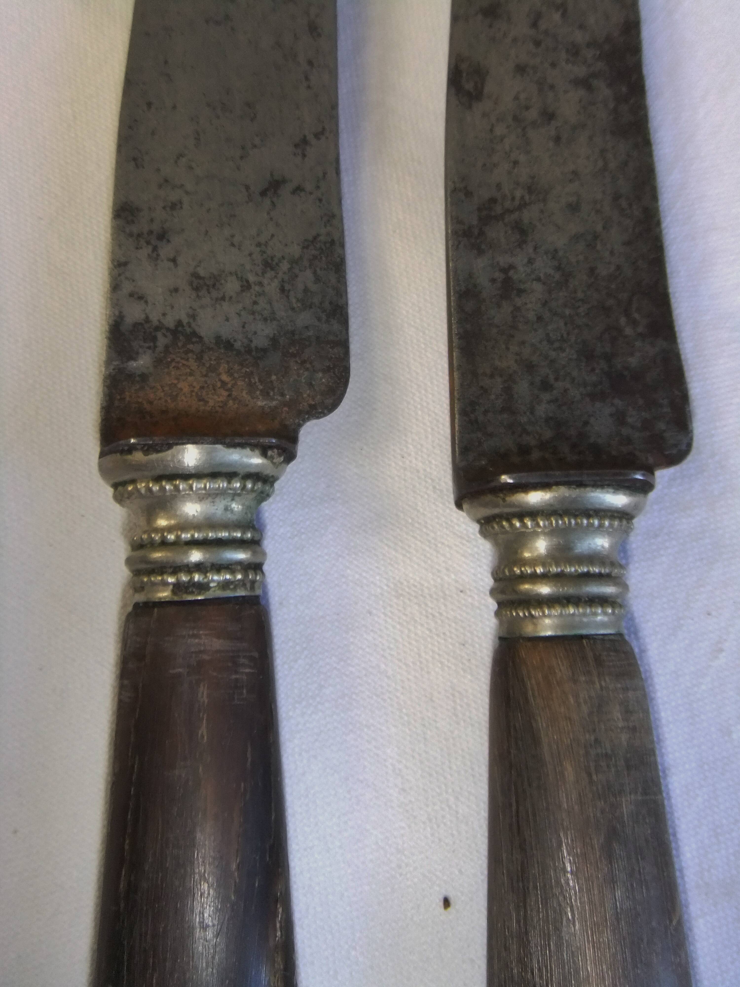 Table service knives old steel blade horn ferrule