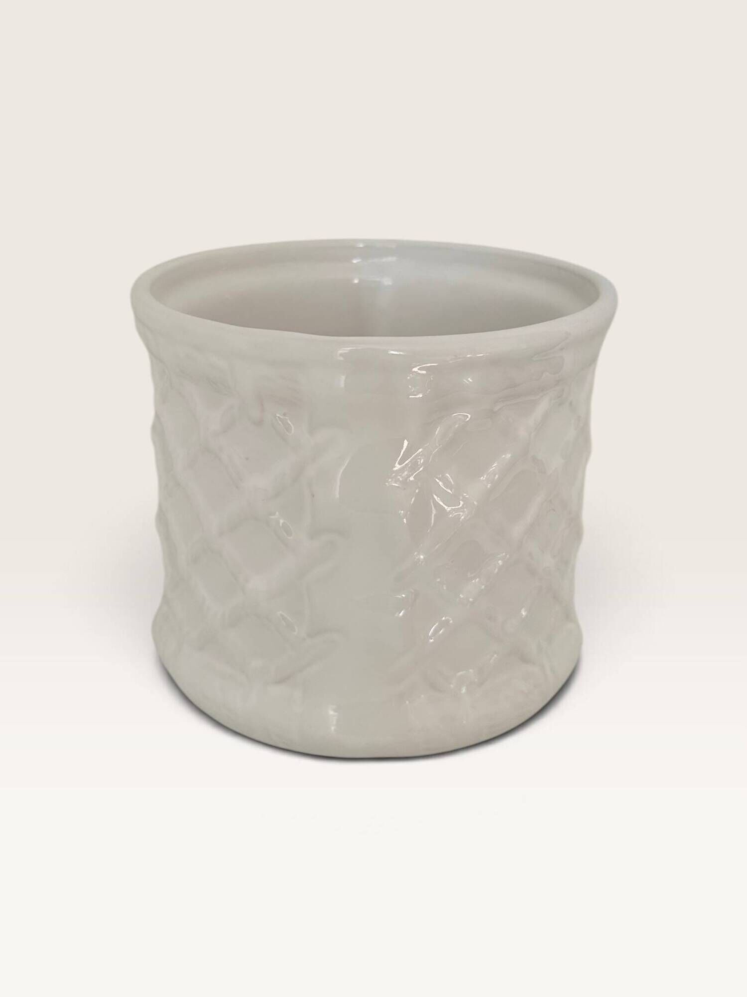 Glazed white earthenware cache-pot