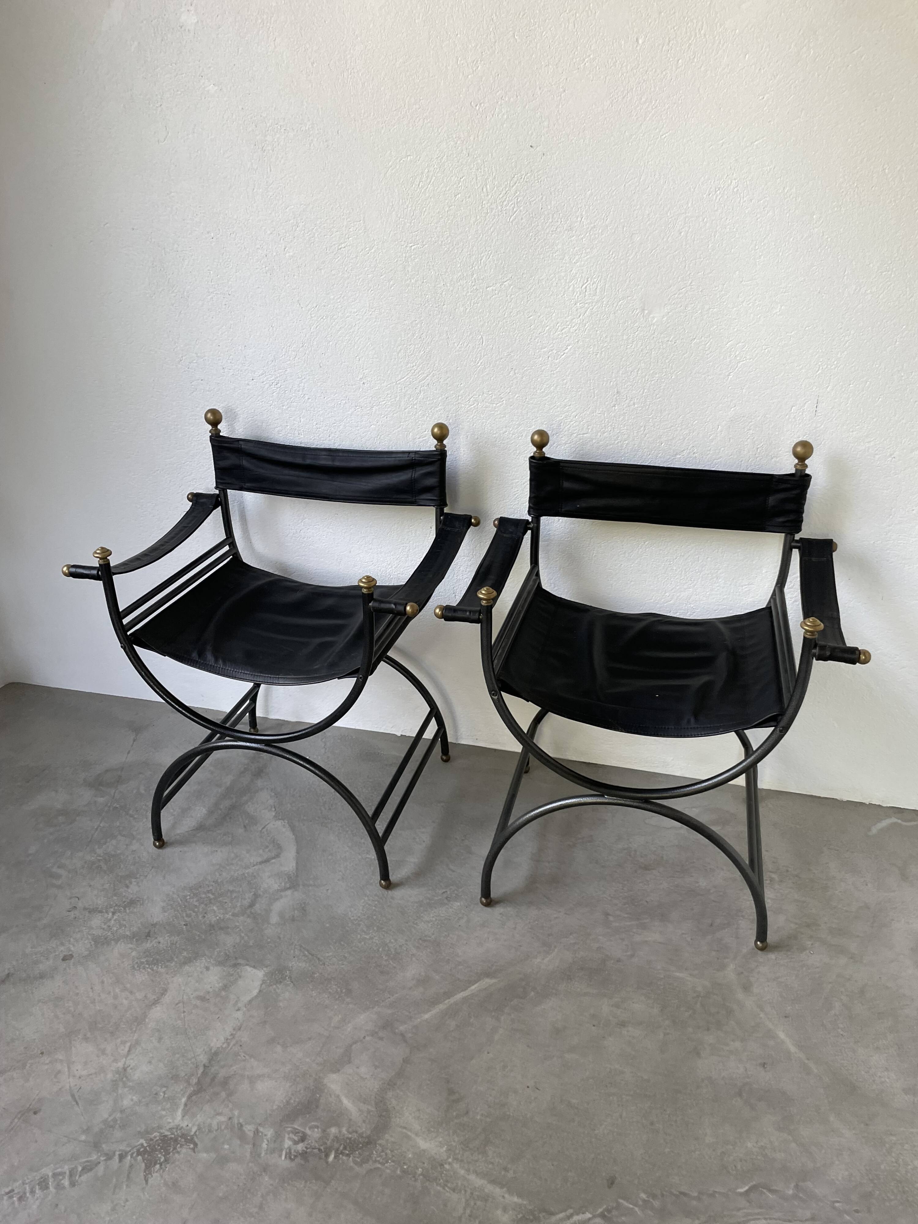 Pair of leather “curule” emperor armchairs
