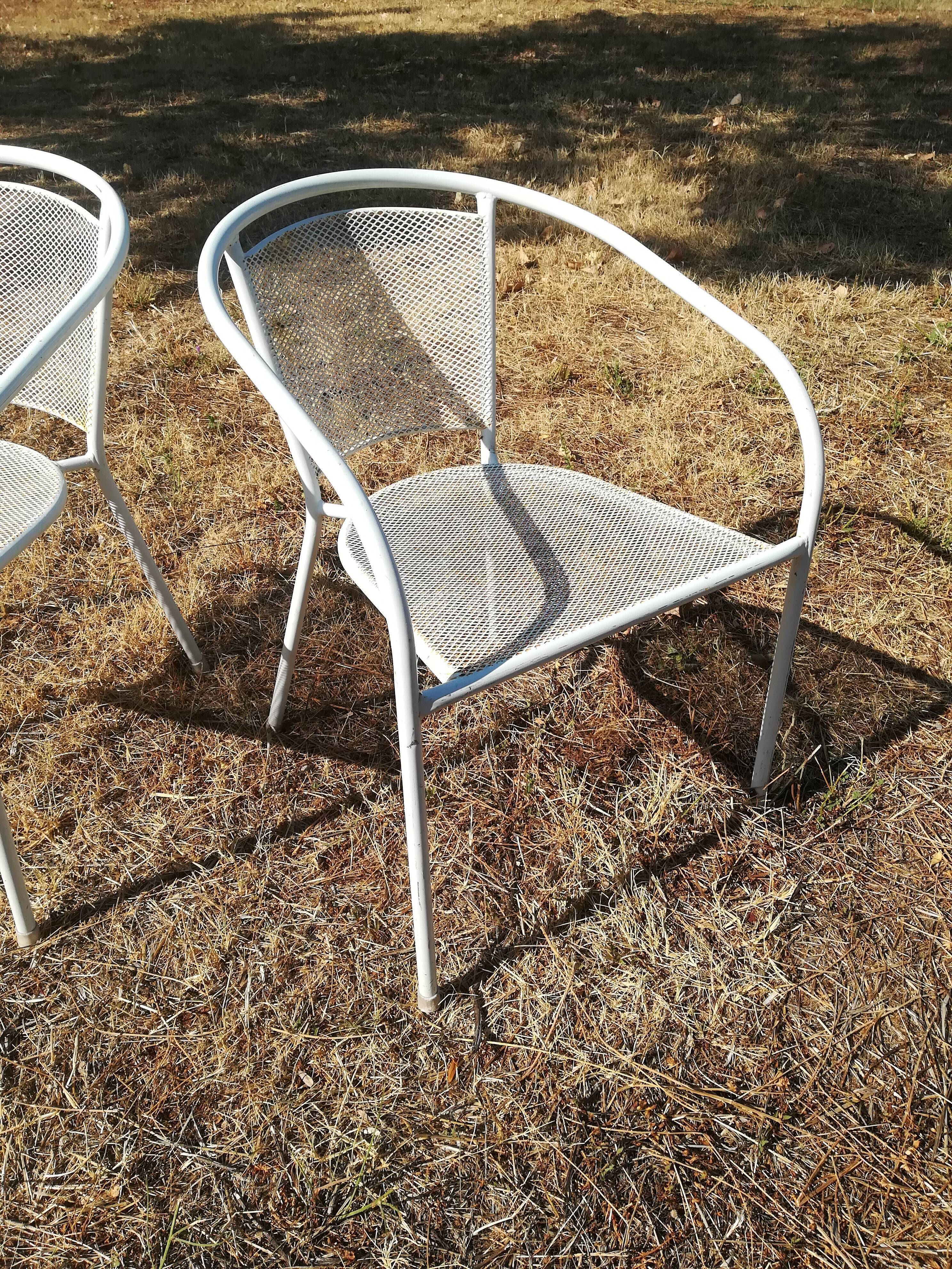 Pair of vintage white metal terrace armchairs