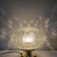 Brass lamp with molded glass globe