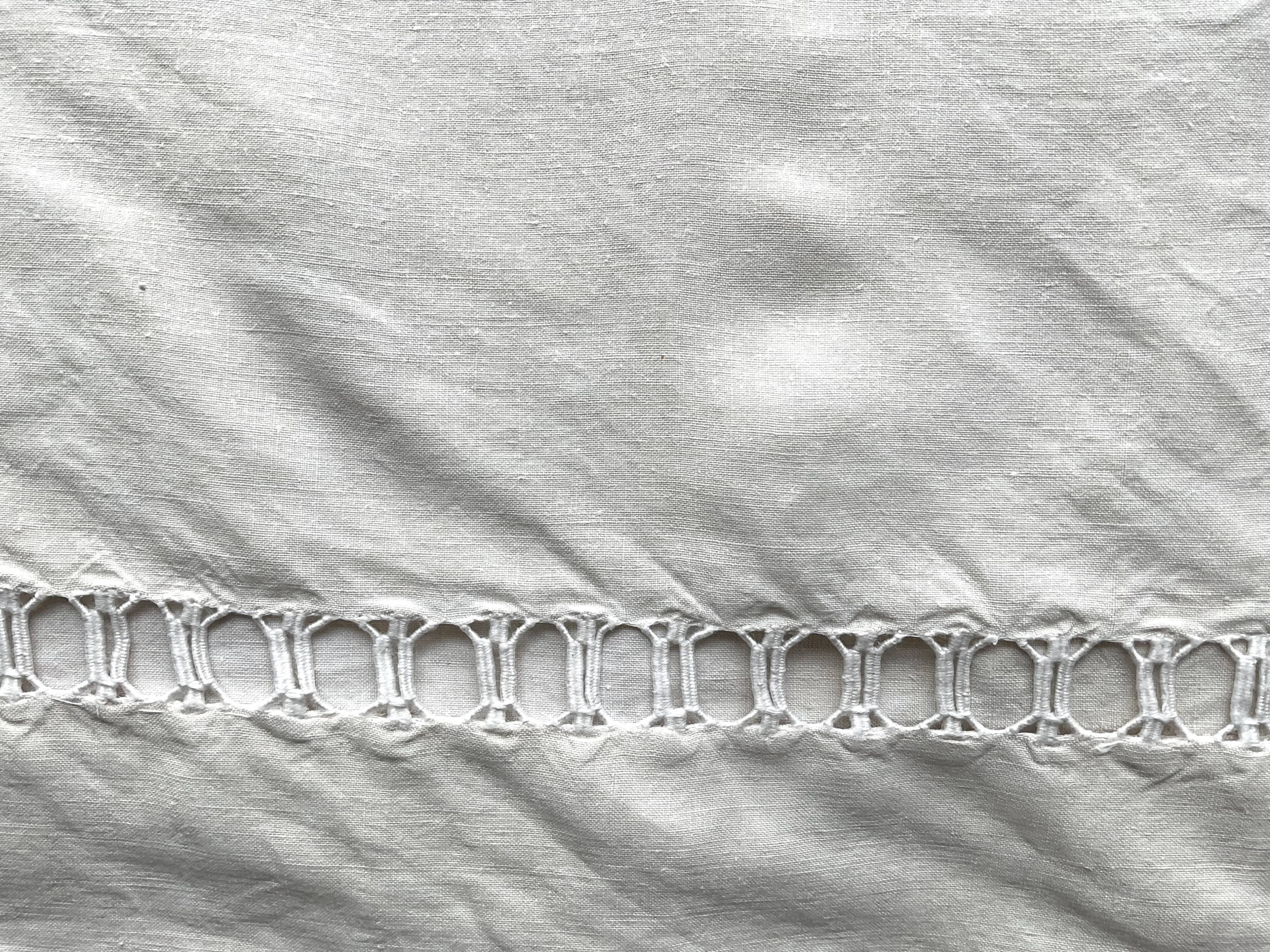 Old hand-embroidered linen sheet