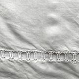 Old hand-embroidered linen sheet