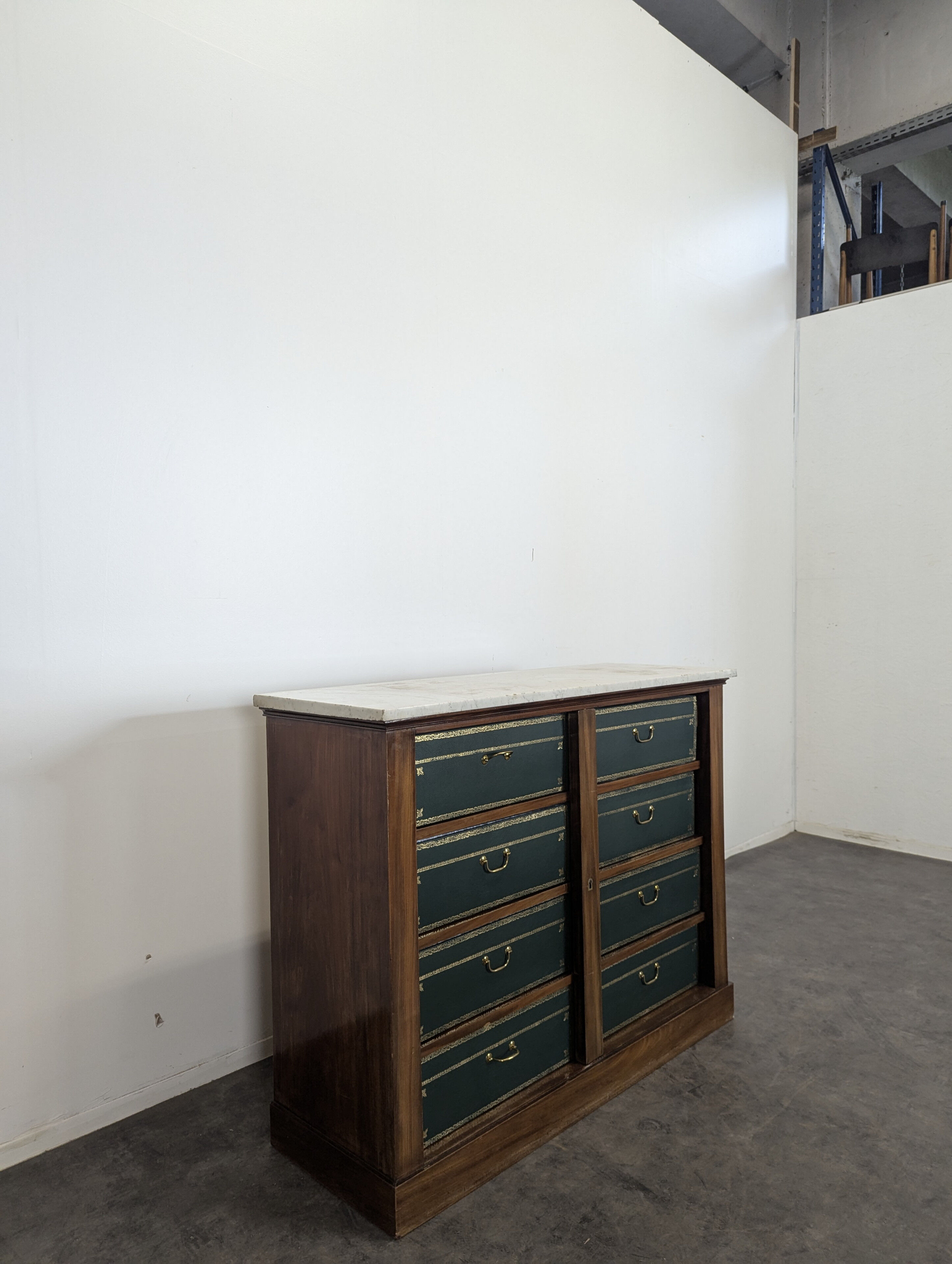 Notary cabinet topped with a Carrara marble.
