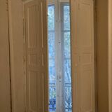 Window with interior shutters