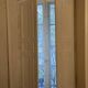 Window with interior shutters