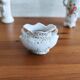 3 bouquetières in porcelain and biscuit