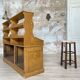 Wooden hardware cabinet painted with wood effect, circa 1940.