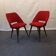 pair of barrel chairs attributed to Pierre Gariche