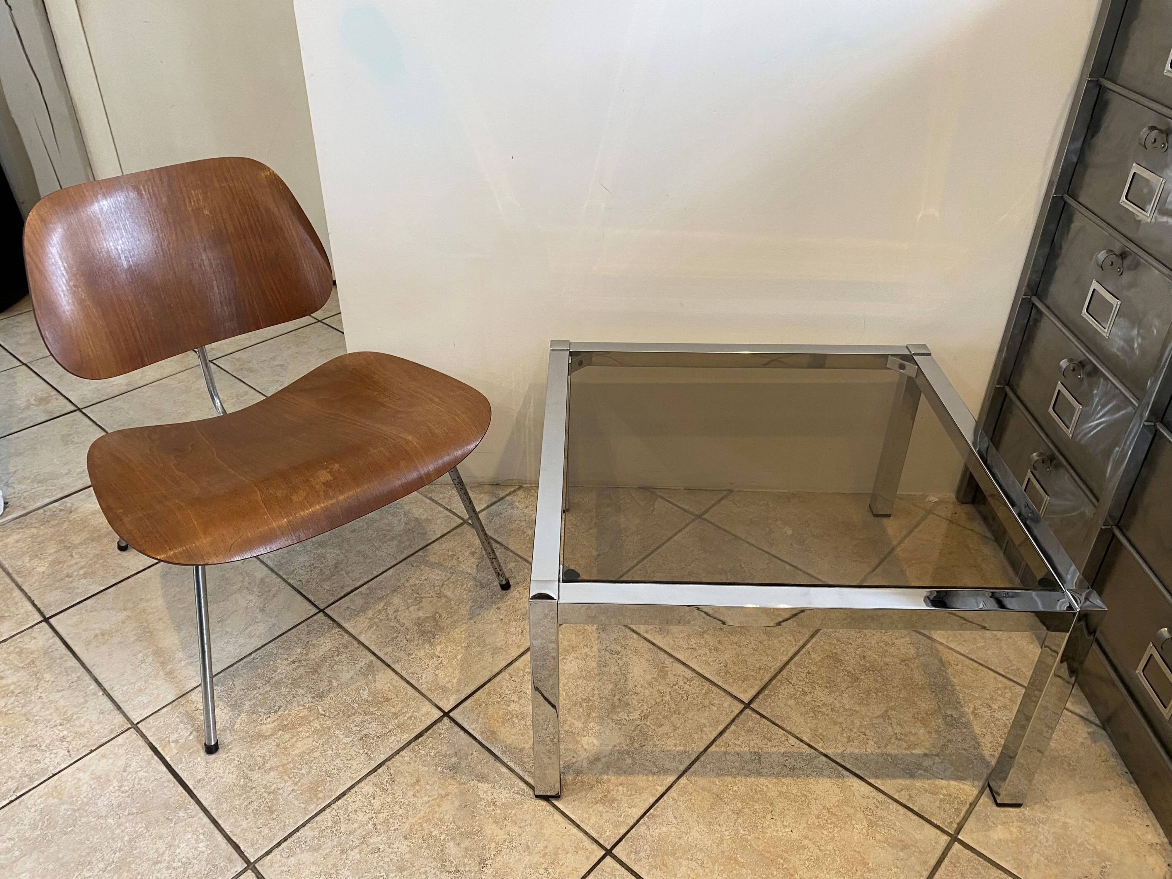 Square coffee table with smoked glass top and chrome base an70