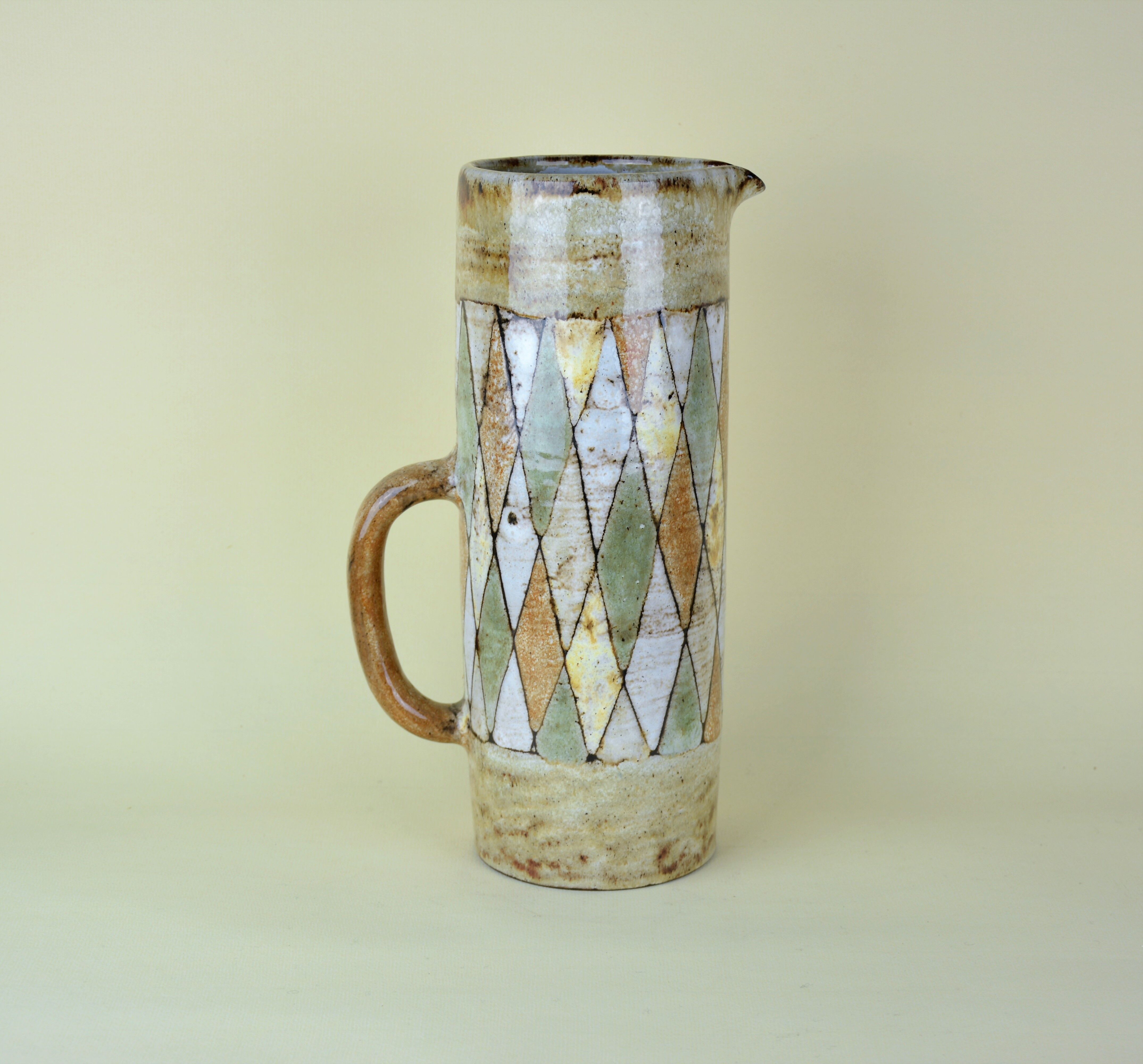 Pitcher and glasses with harlequin decoration, Atelier du Vieux Moulin