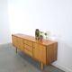 Mid-century notenhout fineer dressoir met 3 lades
