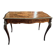 Desk, rosewood marquetry table, bronze ornaments dating from the late 19th century.