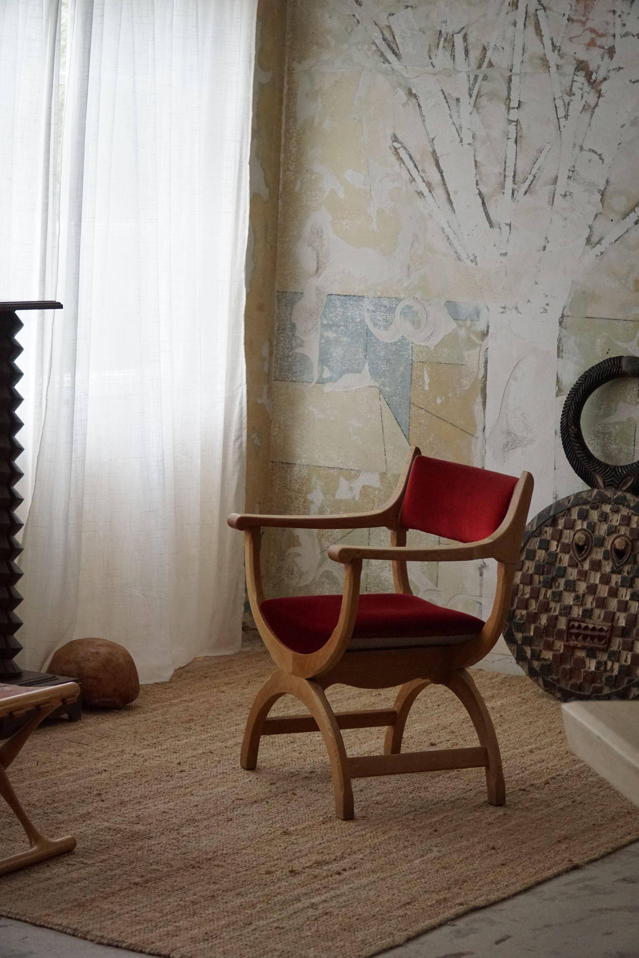 Henning Kjærnulf, Oak and velvet armchair, Model "Kurul", Mid-century, 1960s