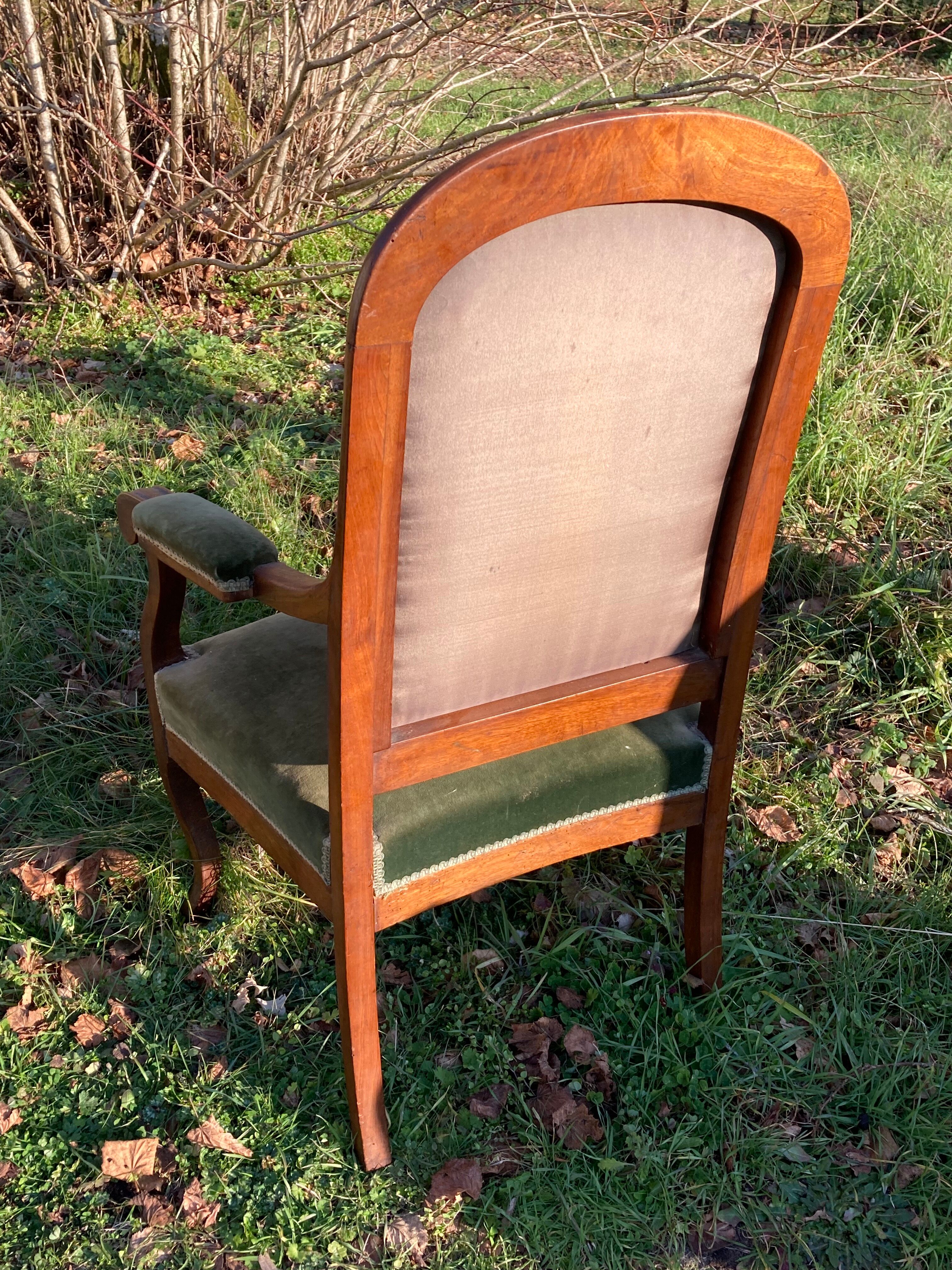 Antique Voltaire armchair in wood and green velvet Louis Philippe