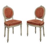 Pair of Louis XVI medallion chairs in lacquered wood.