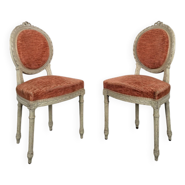 Pair of Louis XVI medallion chairs in lacquered wood.
