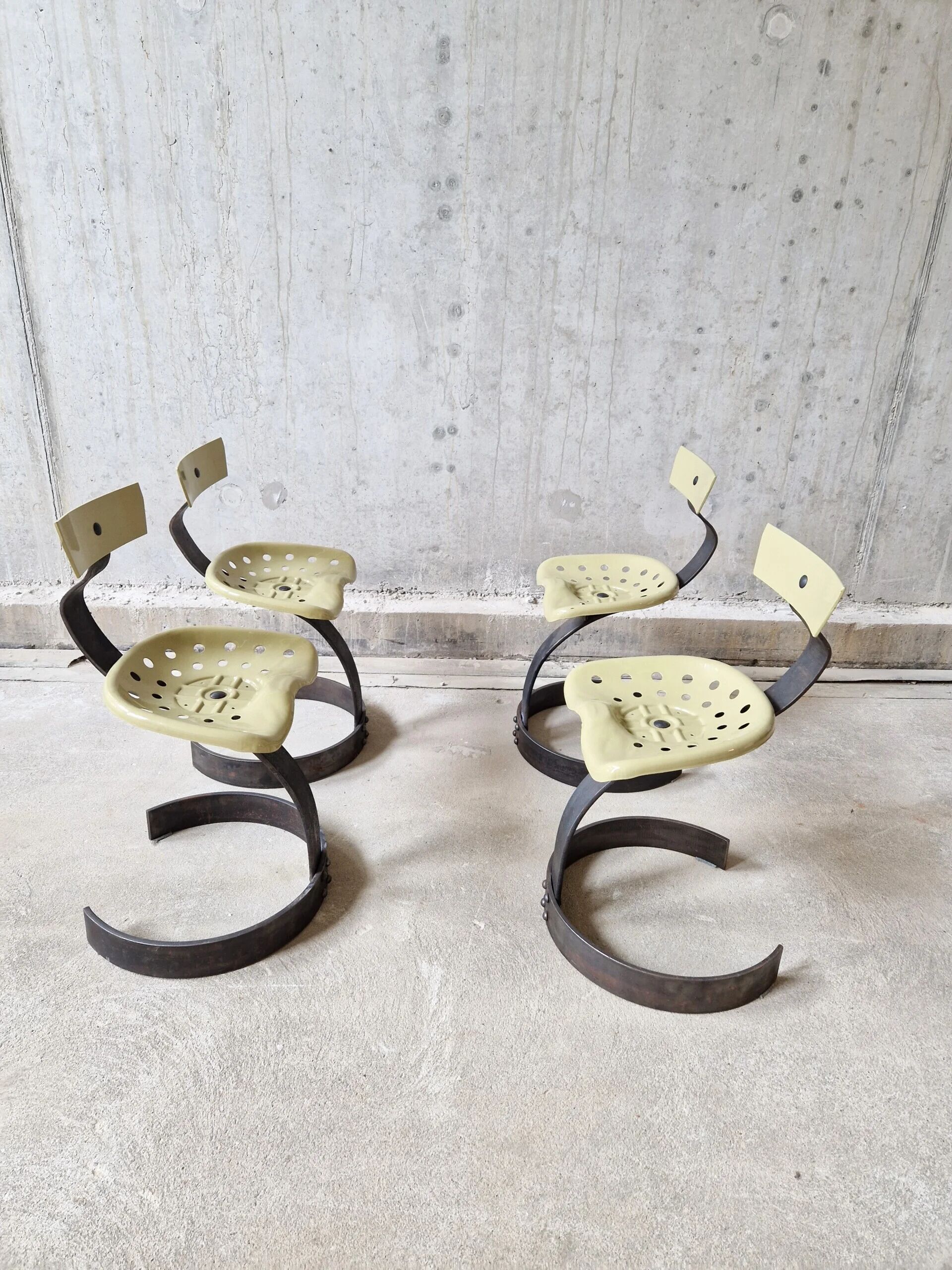 Unique set of 4 metal tractor seat chairs, 1990
