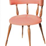 Pink gondola armchair in the style of Helmut.