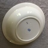 Round hollow earthenware dish