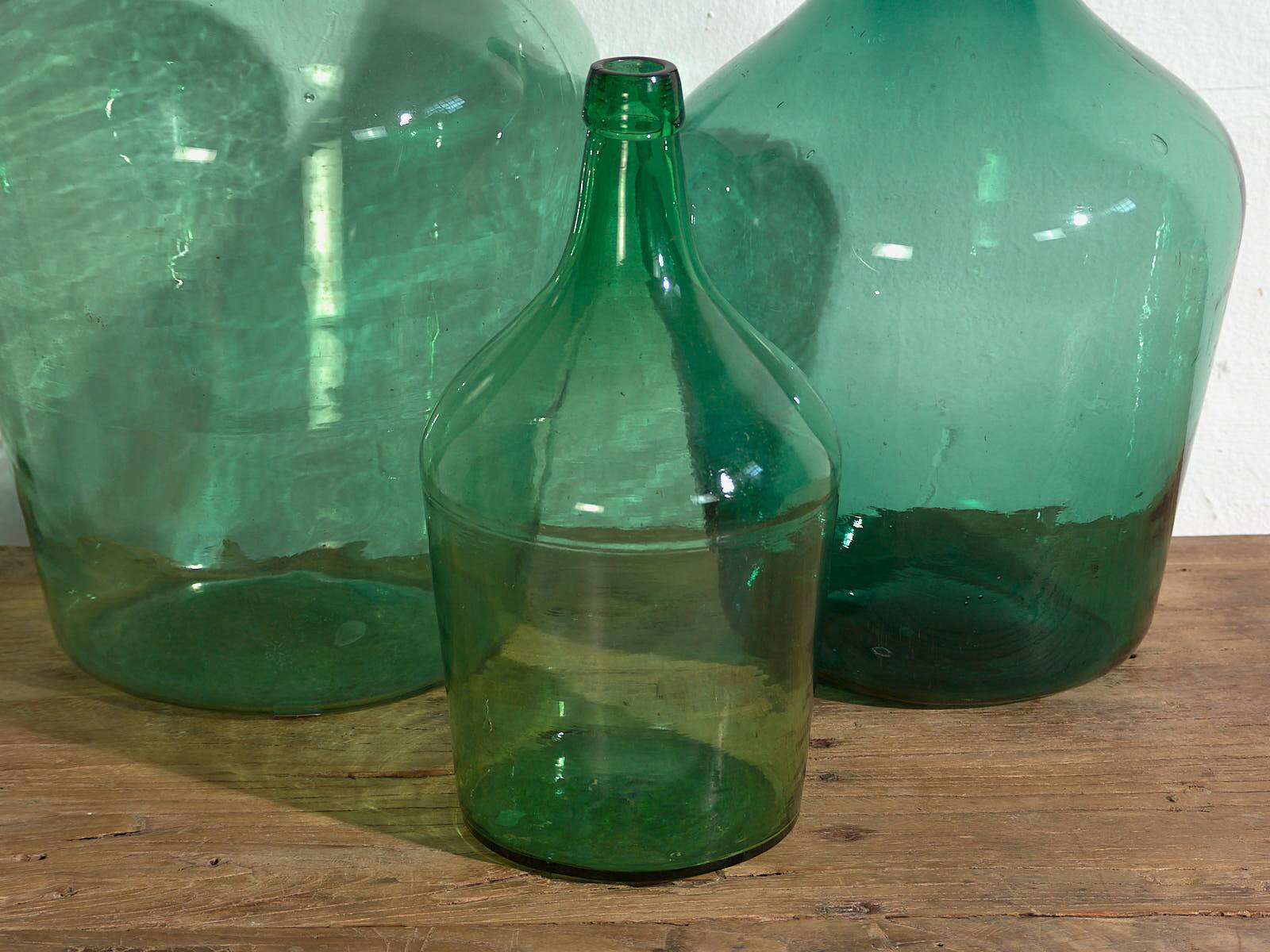 Antique green demijohns (c.1920). 3-piece set #6