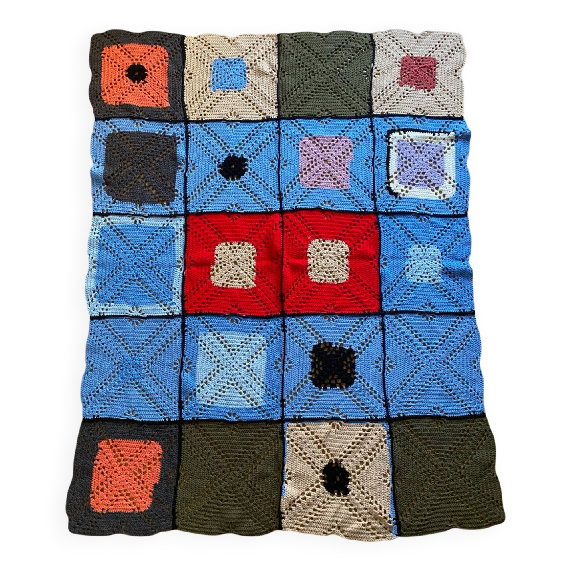 Hand-knitted patchwork blanket