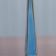 Pair of sterling silver and enamel candlesticks 1927 by Charles Green & Co.