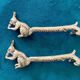 10 animal-shaped knife holders in silver-colored metal