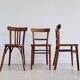 Mismatched wooden bistro chairs