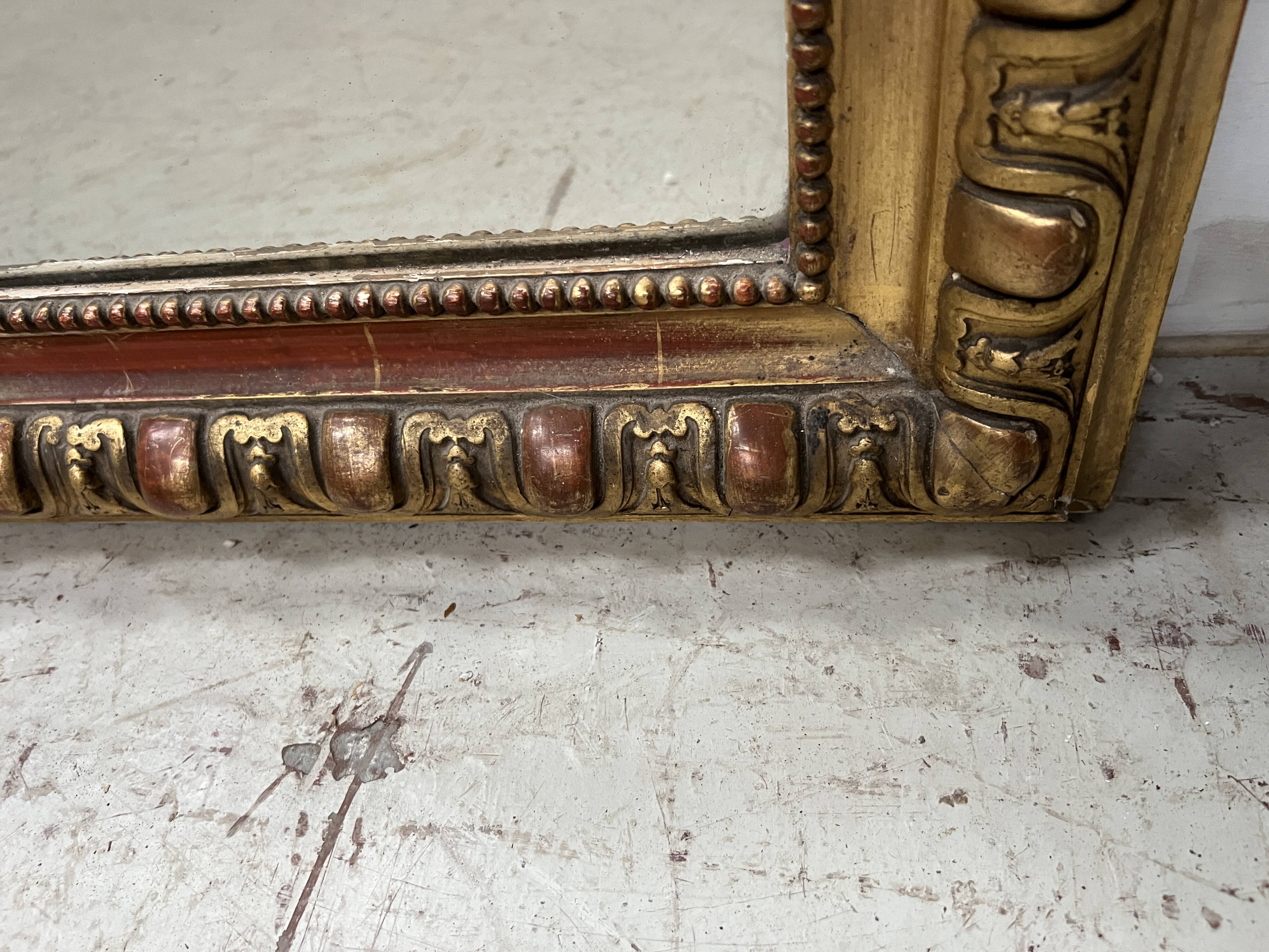 Louis Philippe gadrooned mirror in wood and gilt stucco, 19th century