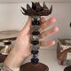 Pair of mid-century candlesticks in brass and glass beads, base in
