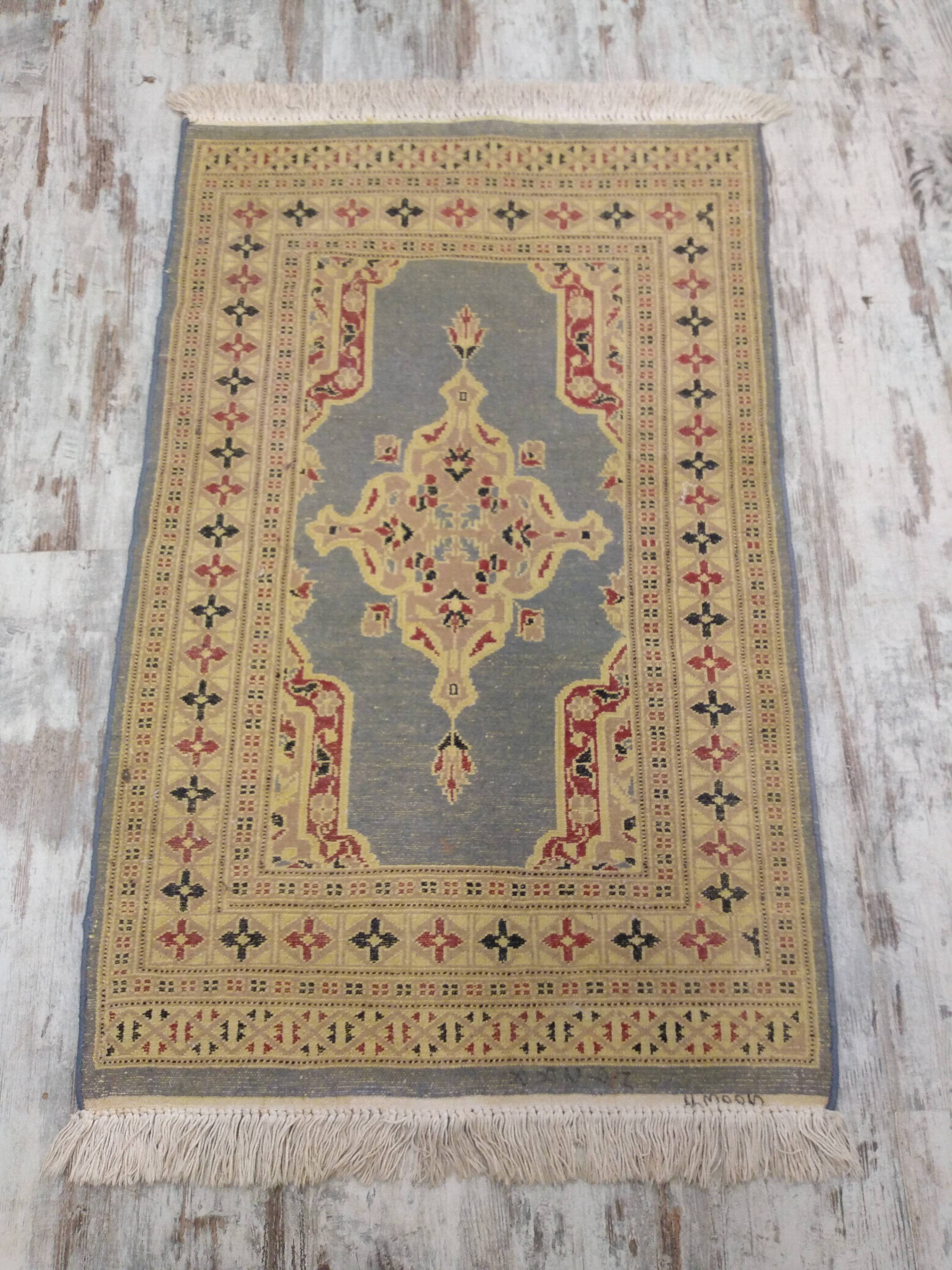 Handmade wool and silk Persian rug