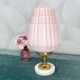 Art Deco lamp with pastel pink opaline globe.