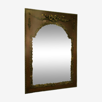 Mirror with wood frame and gilded stucco