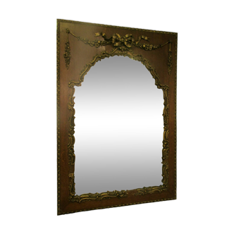 Mirror with wood frame and gilded stucco