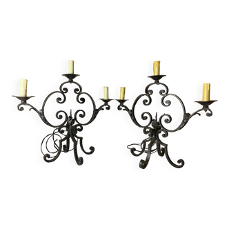 Pair of 3-light wrought iron candlesticks on vintage legs