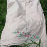 Hand embroidered sheet pink flowers green foliage