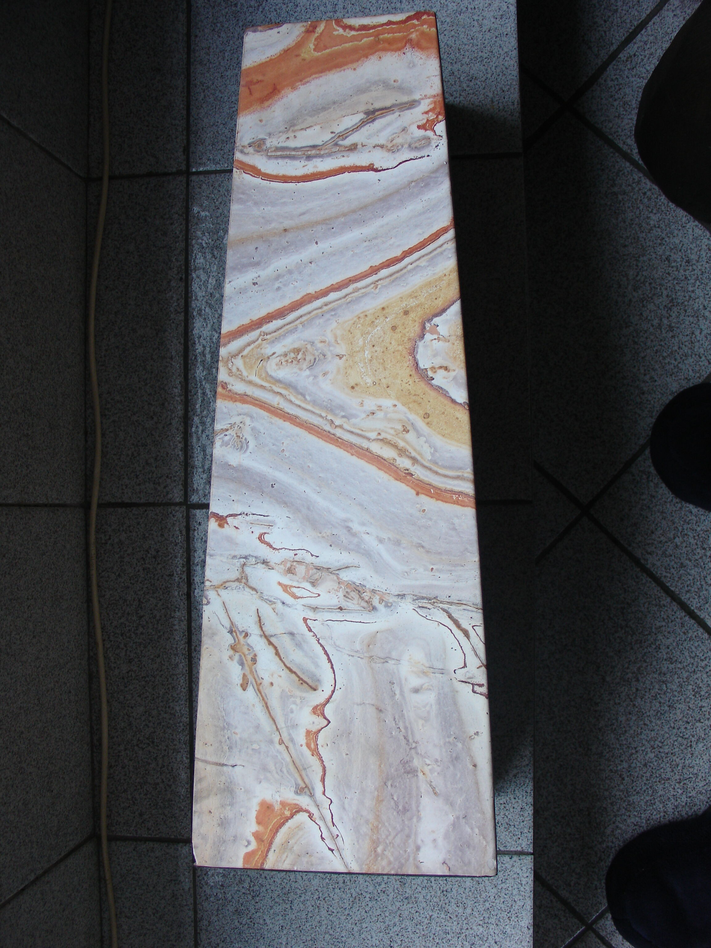 Floor vase in serpentine marble carved from a single block