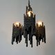 Three-armed suspended lamp in wrought iron, brutalist design, 1960s, Italy.