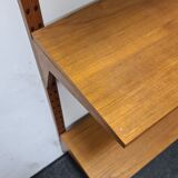 Vintage teak wall system by Poul Cadovious