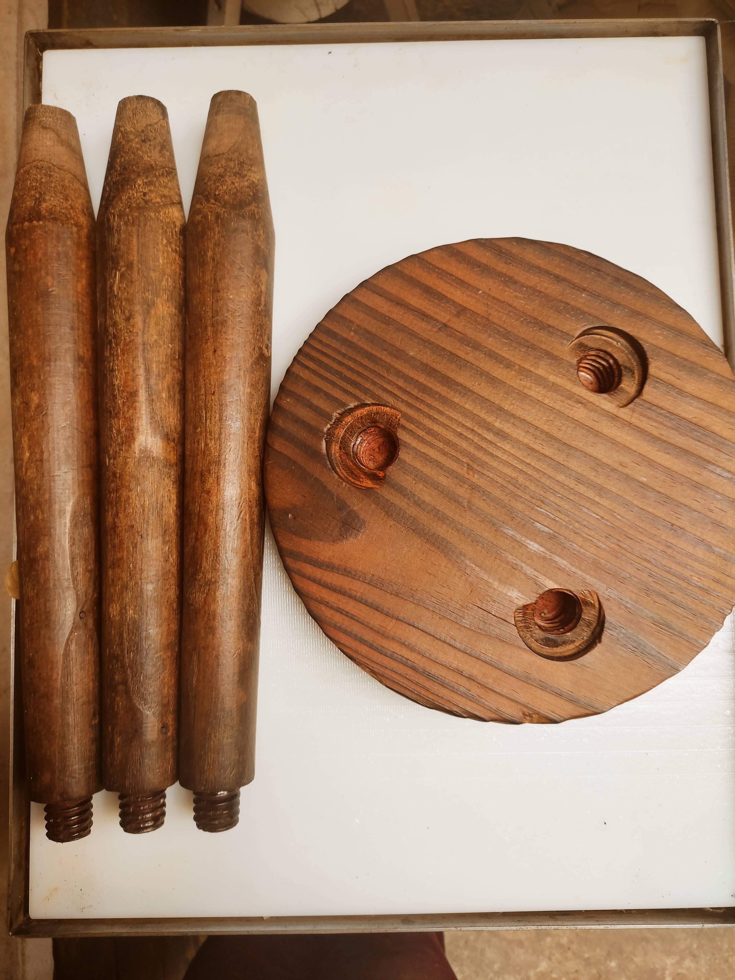 Wooden tripod stool