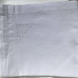 Rectangular tablecloth with embroidered openwork pattern